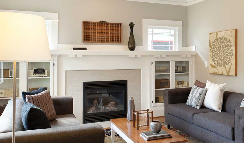 12 Cozy & Beautiful Fireplaces http://www.beautifuldesignmadesimple.com fireplace with built-in white shelving in a casual living room
