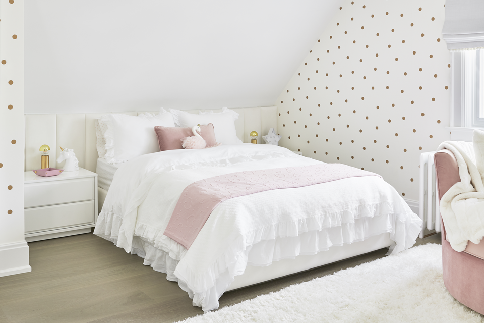 children's room wilth polka dot wall paper Interior Design by Sara Bederman