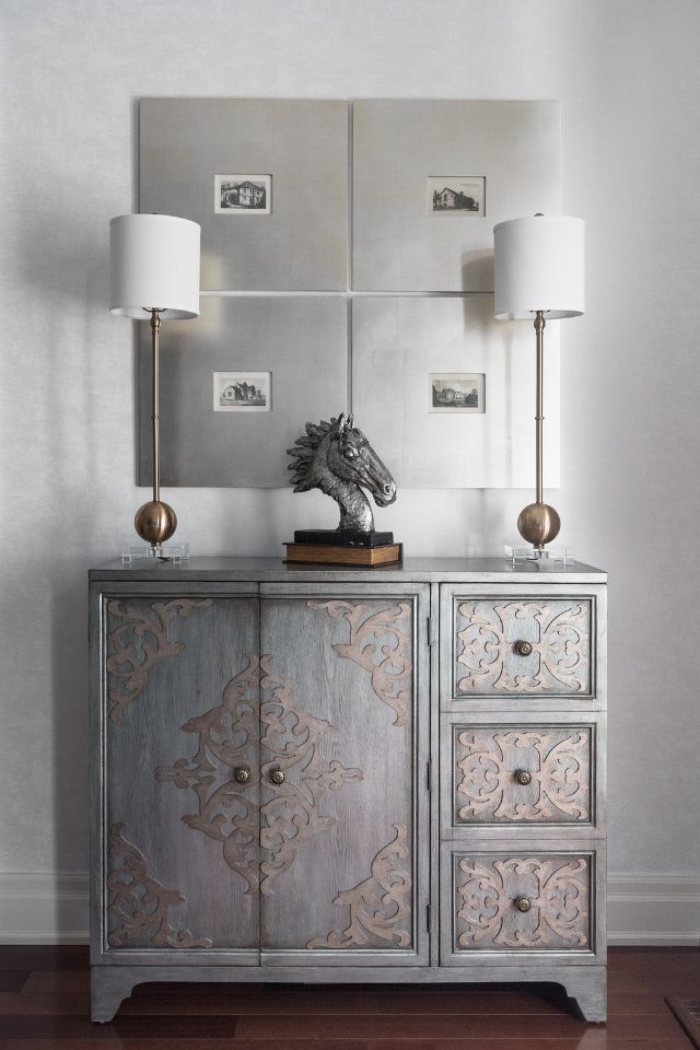 Silver dresser table with two lamps