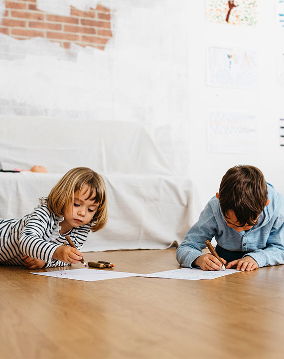 kids drawing on family friendly flooring