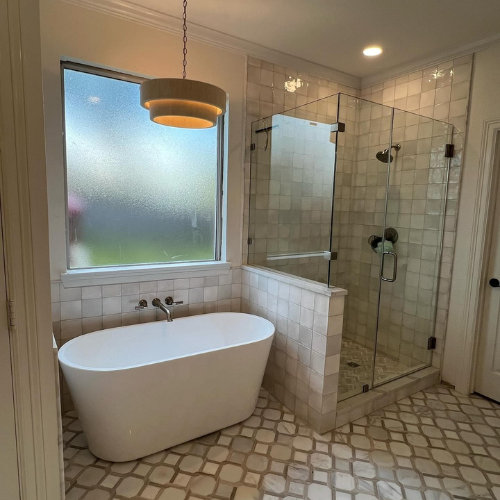 bathroom, tile floors, white tub, window above tub