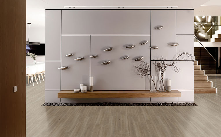 luxury vinyl plank flooring in entryway with quiet luxury decor